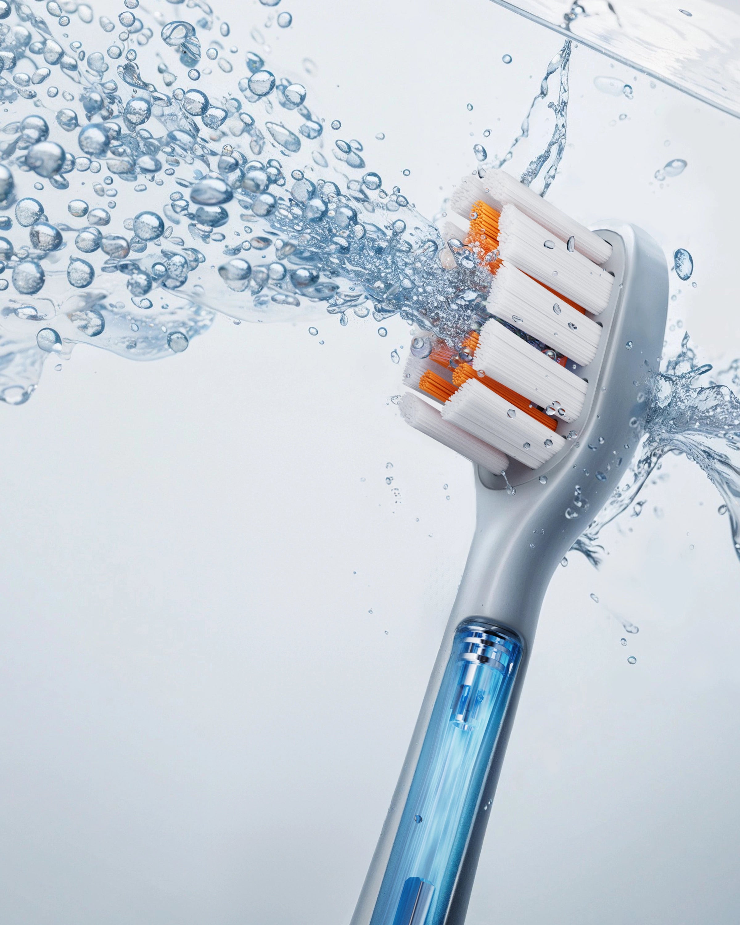 AirJet X3 Conadǎ brush head with water and bubble blowing out.